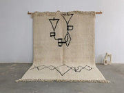 DecorBites™ moroccan handmade beni ouarain rug 310 x 210 cm beige wool with black geometric patterns and fringed edges