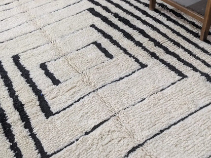 Cream-colored plush wool beni ouarain rug with bold black geometric stripes moroccan handmade traditional design