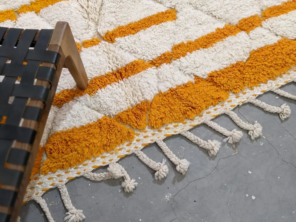 Cream and mustard-yellow striped moroccan handmade beni ouarain rug with fluffy texture and tassels 248 x 158 cm