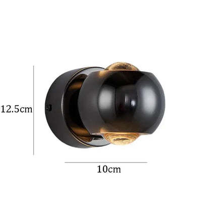 DecorBites Moroccan modern black brass led wall lamp with black matte finish and amber-tinted glass accent