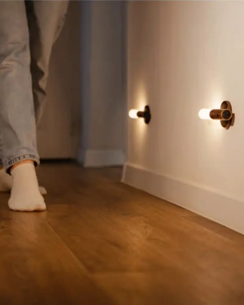 Warm-toned minimalist decorbites™ moroccan rechargeable battery wall sconce with brass finish and exposed bulb bases