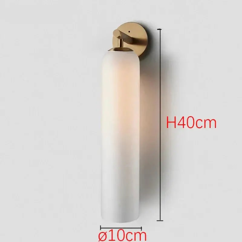 Decorbites™ sleek glass wall sconce with frosted white shade and brushed brass mount for energy-efficient led bulbs