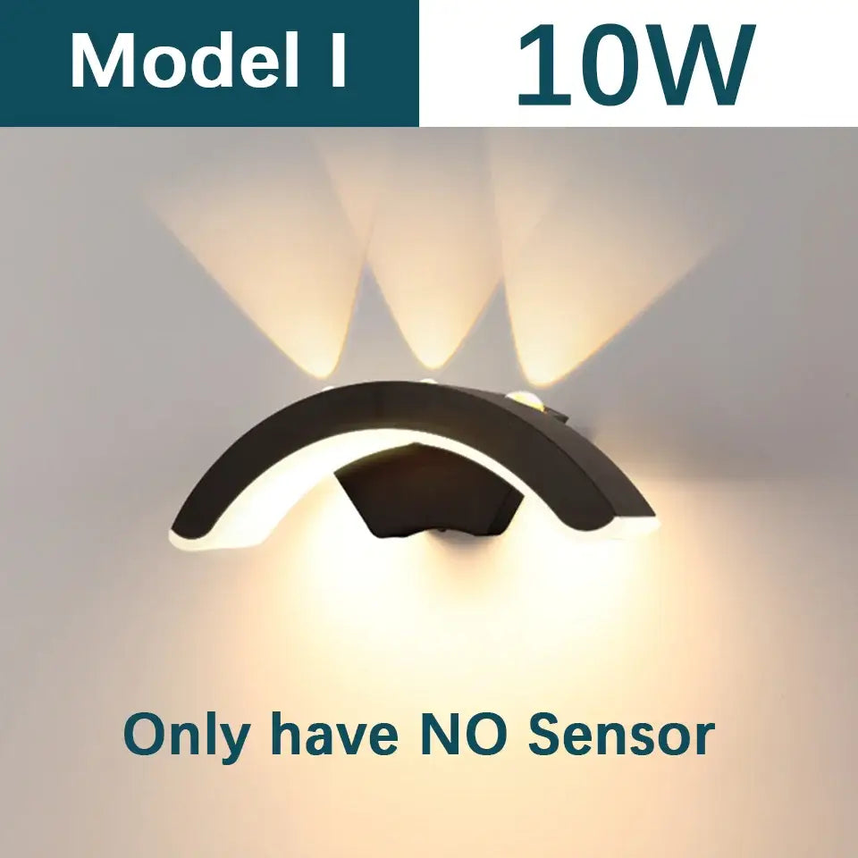 Modern black curved DecorBites motion sensor outdoor wall light emitting three warm white beams, waterproof and sleek design