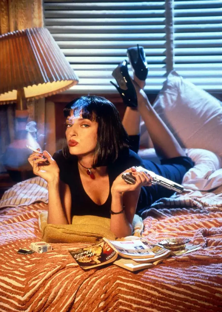 Black leather choker with red pendant featured alongside DecorBites™ pulp fiction canvas wall art for movie decor