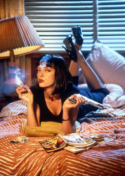 Black leather choker with red pendant featured alongside DecorBites™ pulp fiction canvas wall art for movie decor