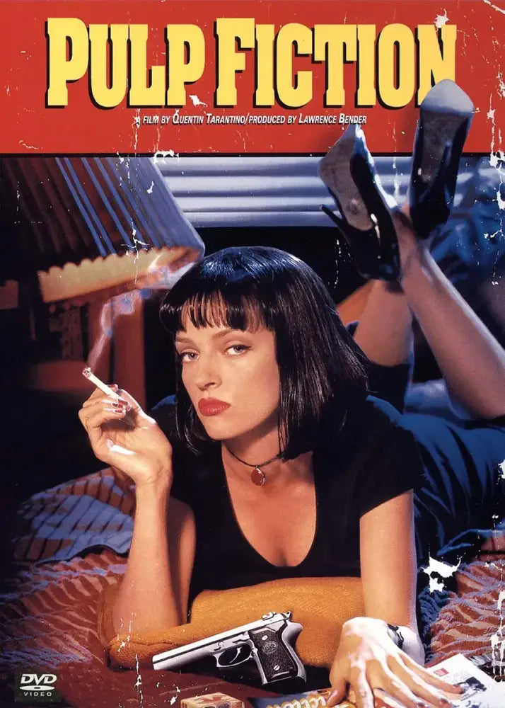 The pulp fiction canvas wall art features uma thurman as mia wallace reclining with black heels on a bed