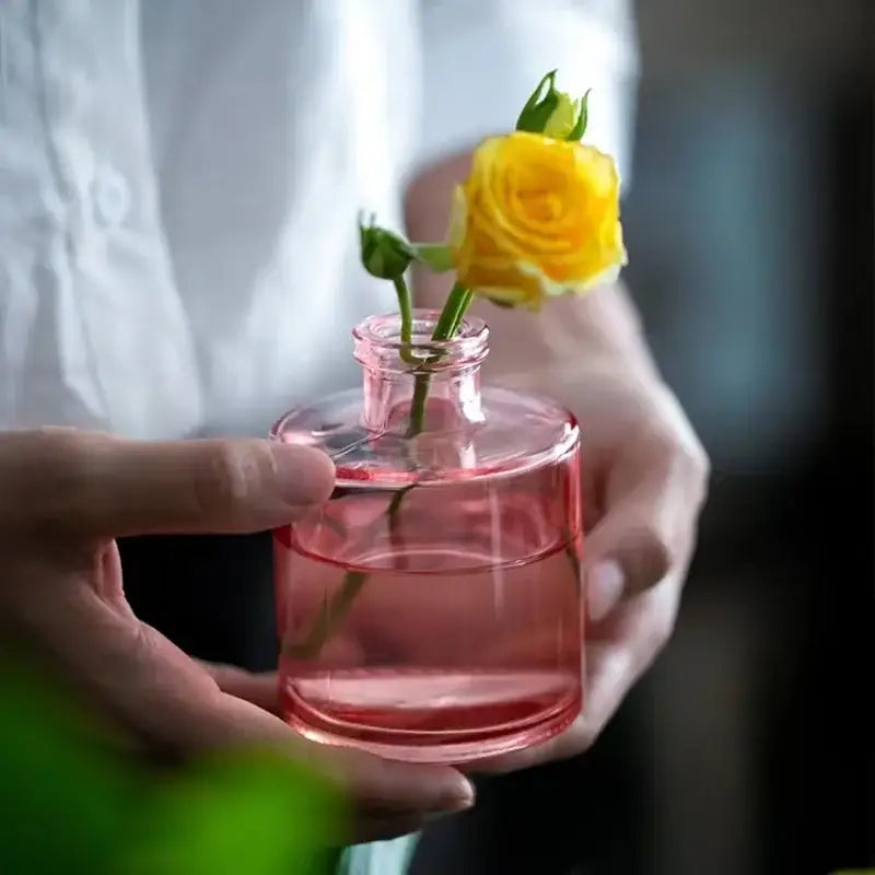 DecorBites™ delicate pink glass vase with 2cm opening holding a yellow rose for home gift flower pot decoration