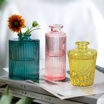 Three colorful ribbed glass vases in teal pink and yellow with 2cm opening perfect as flower pots or home decor