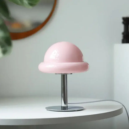 Pastel pink dome-shaped mushroom table lamp with sleek chrome stand by decorbites bauhaus furniture