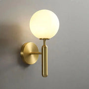 Gold-finished decorbites mynate wall sconce with frosted glass globe for luxury indoor lighting decor