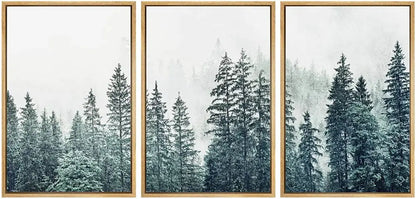 Set of three DecorBites™ nature landscape canvas prints with misty pine trees in muted teal and gray tones in light wood frames