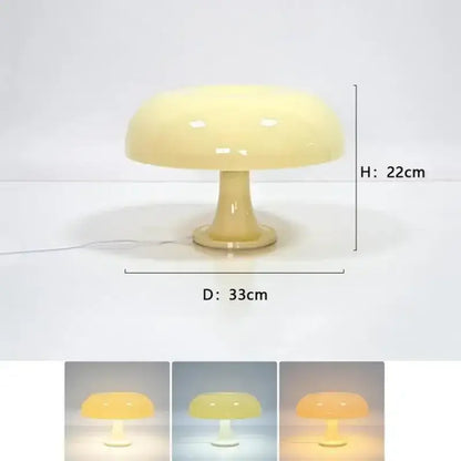 Cream-colored led mushroom table lamp with glossy acrylic finish and slender stem for modern bedroom decor