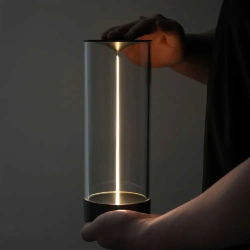 DecorBites™ Nordic battery operated table lamp with sleek glass cylinder, black base, and warm vertical light strip