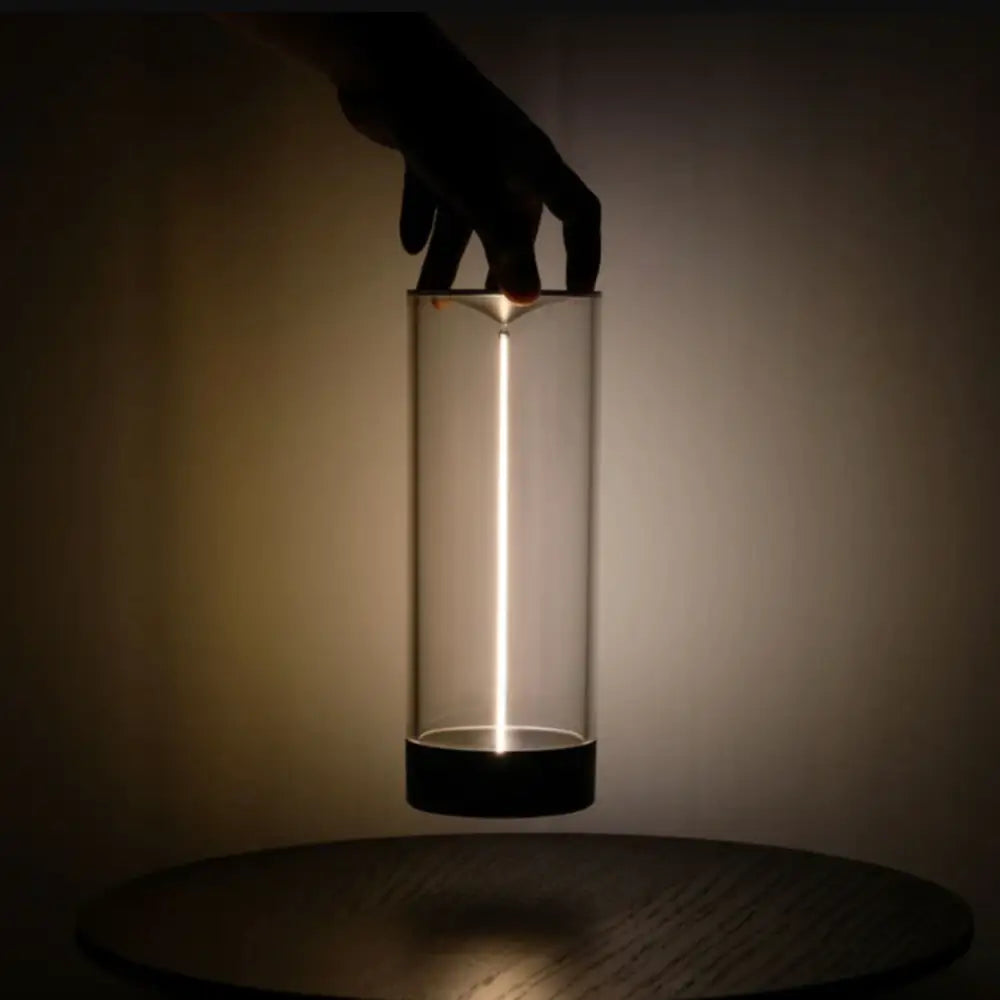Decorbites™ nordic battery operated table lamp with sleek transparent cylindrical design and glowing vertical light strip