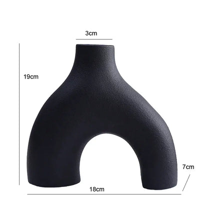 Black matte nordic ceramic flower vase with modern asymmetrical u-shaped design for vases home decor