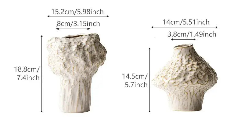 Two off-white nordic ceramic vases with textured pebbled surfaces and flared necks in decorbites nordic ceramic vase with pampas grass
