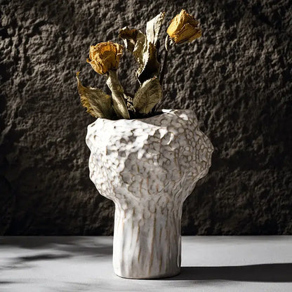 DecorBites™ nordic ceramic vase in white with a textured surface holding dried yellow roses