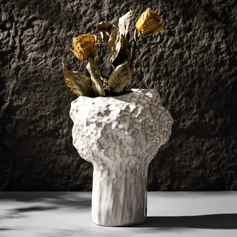 DecorBites™ nordic ceramic vase in white with a textured surface holding dried yellow roses