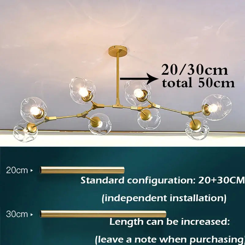 Gold-toned nordic chandelier with clear glass globe shades and branching metal frame for living room hanging light fixture