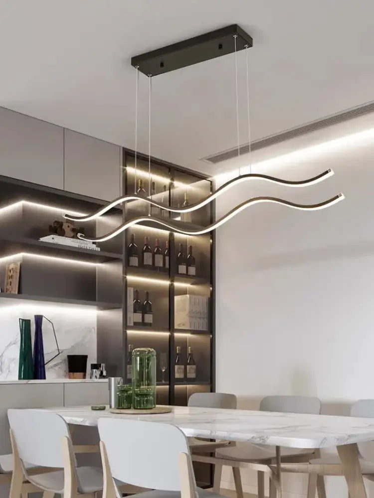 Modern black rectangular pendant lights with sleek wavy LED arms emitting soft white glow for dining room nordic chandeliers
