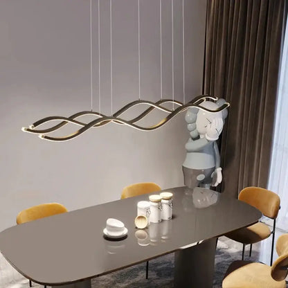 Modern gold-toned wave-shaped led pendant lights with sleek curves for dining room nordic chandeliers by decorbites