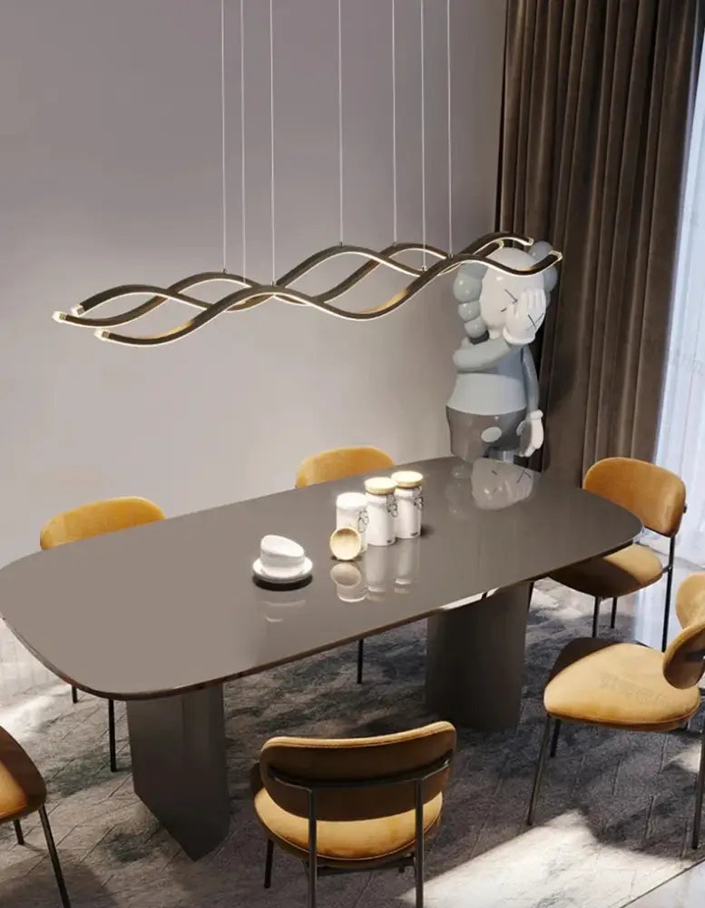 Modern gold-toned wave-shaped pendant light by decorbites™ nordic chandeliers for elegant dining room lighting