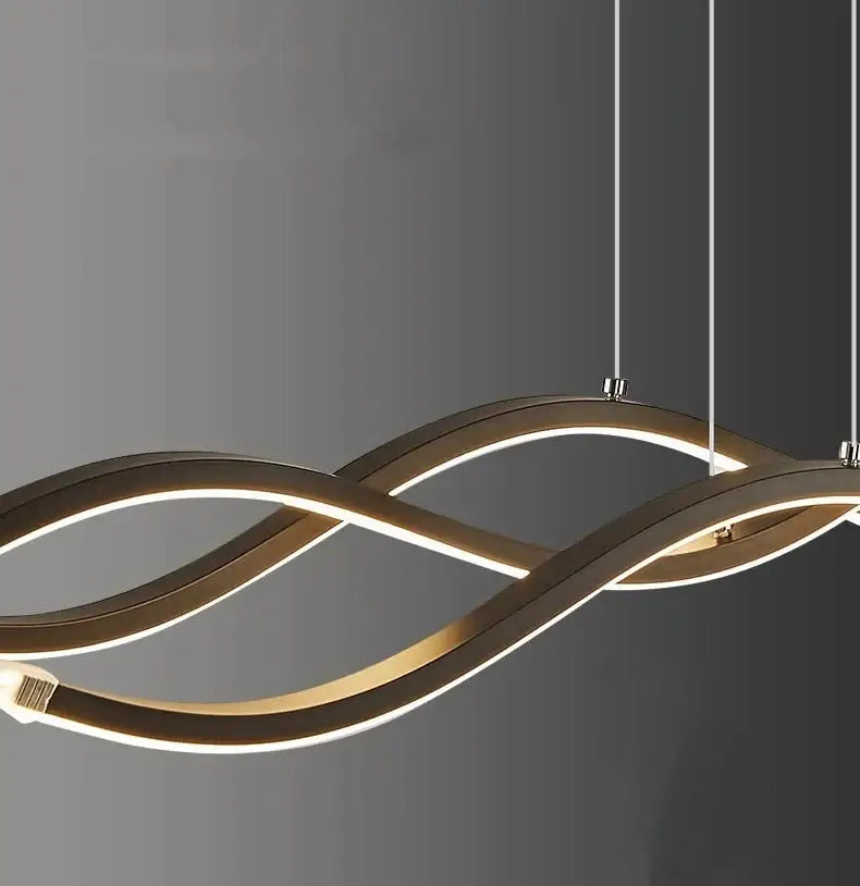 Modern gold-toned LED nordic chandelier with sleek wave design and glowing illumination for dining room lighting