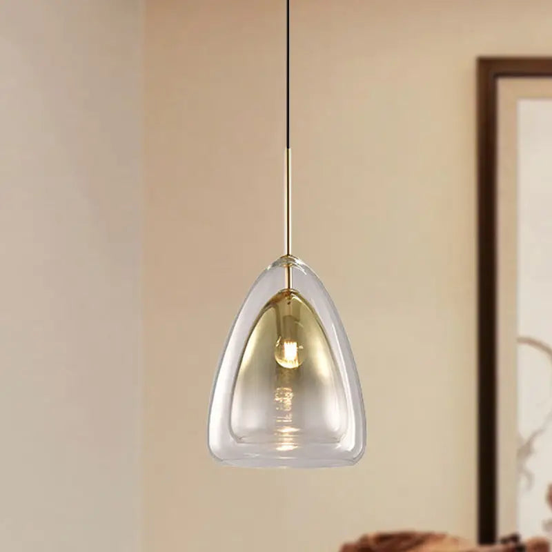 DecorBites Nordic pendant light fixture with clear teardrop glass shade and gold-toned metal champagne suspension
