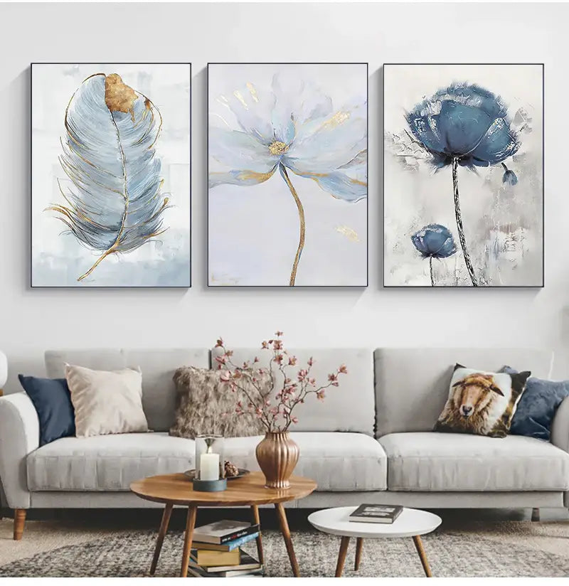 Set of three DecorBites™ canvas art prints featuring nordic flower abstract designs in soft blues golds and grays