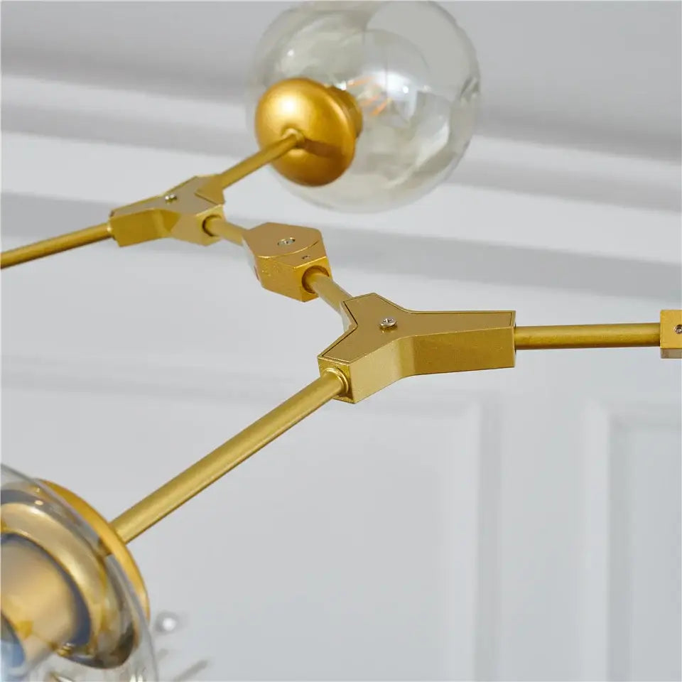 Gold-toned decorbites nordic glass ball led chandelier with clear glass globe bulbs in black and gold finish