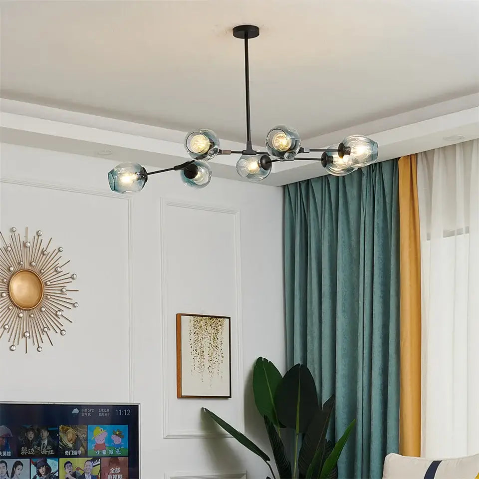Modern black metal nordic glass ball led chandelier with six clear glass globe bulbs for stylish lighting