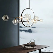 Modern black metal nordic glass bubble led chandelier with clear glass globe bulbs arranged circularly and linearly