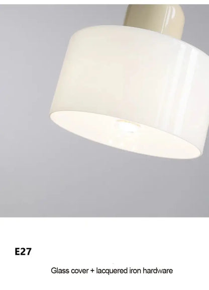 Cream-colored cylindrical glass lampshade with matte finish and lacquered iron hardware in nordic glass chandelier