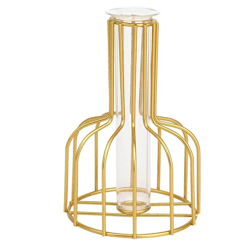 Gold-toned iron golden hydroponic vase with clear glass slender neck encased in metal cage by decorbites