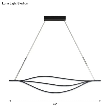 Modern black led lightbulb pendant light with curved metallic leaf-like strips suspended from silver cables