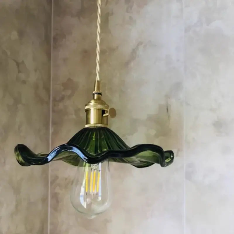 DecorBites™ Nordic led pendant light with green glass wavy design and brass hardware on a chain cord hanging fixture