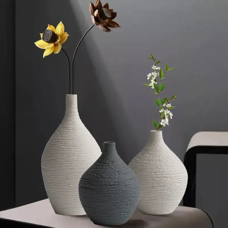 Three textured white and gray ceramic vases with dried flowers nordic luxury ceramic vase for home décor by decorbites