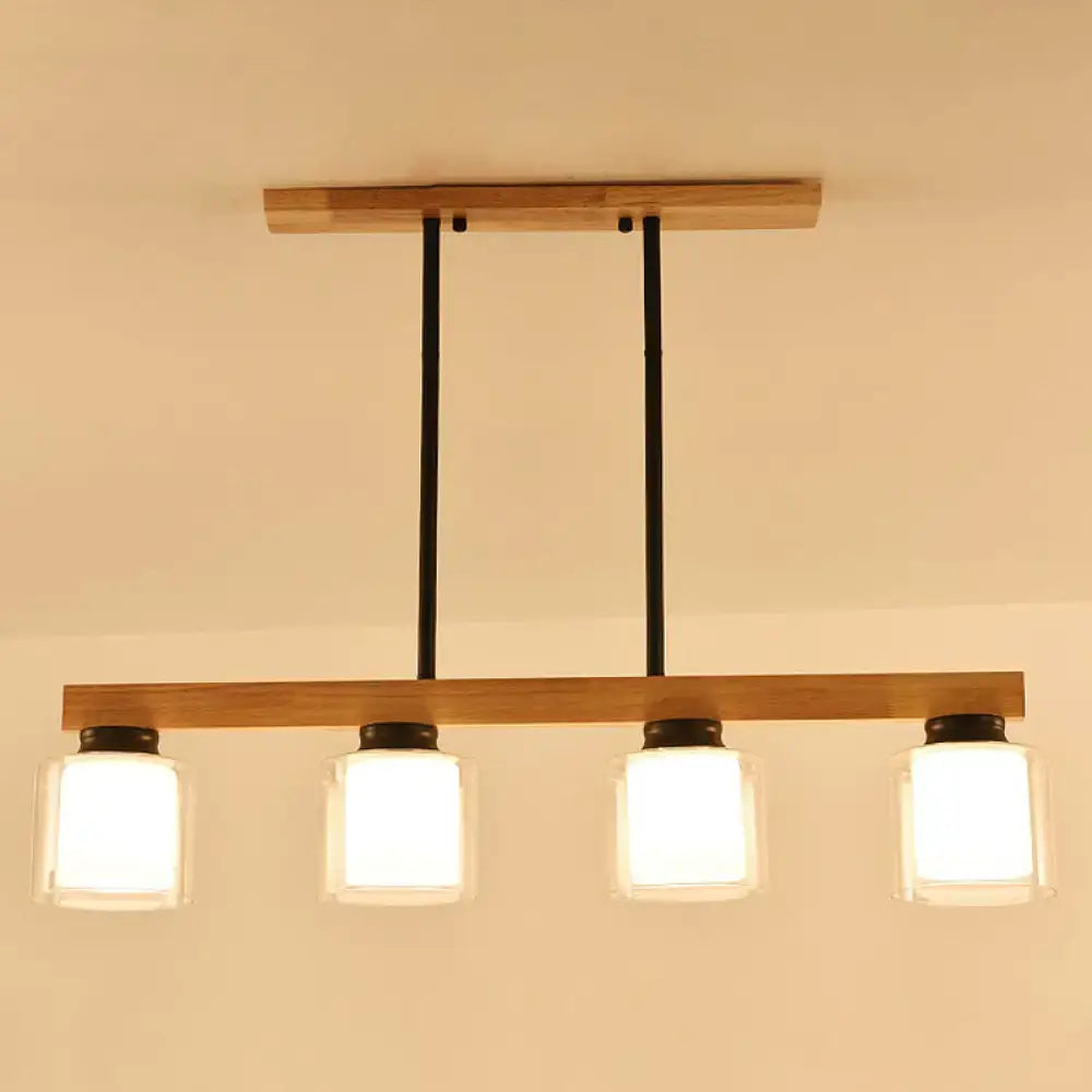 DecorBites™ nordic modern wood island pendant with four frosted glass shades and black metal accents