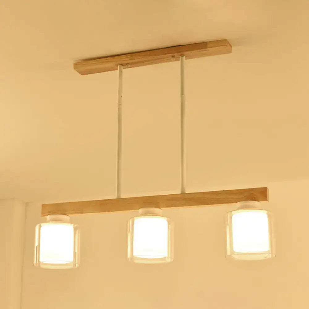 DecorBites™ nordic modern wood island pendant light with three clear glass shades and slender metal rods
