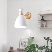 White conical metal wall sconce with wooden mount and joint nordic plug ideal for minimalist home decor
