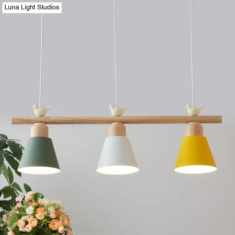 DecorBites™ nordic shaded hanging island light with three conical shades in sage green white mustard yellow wood bar