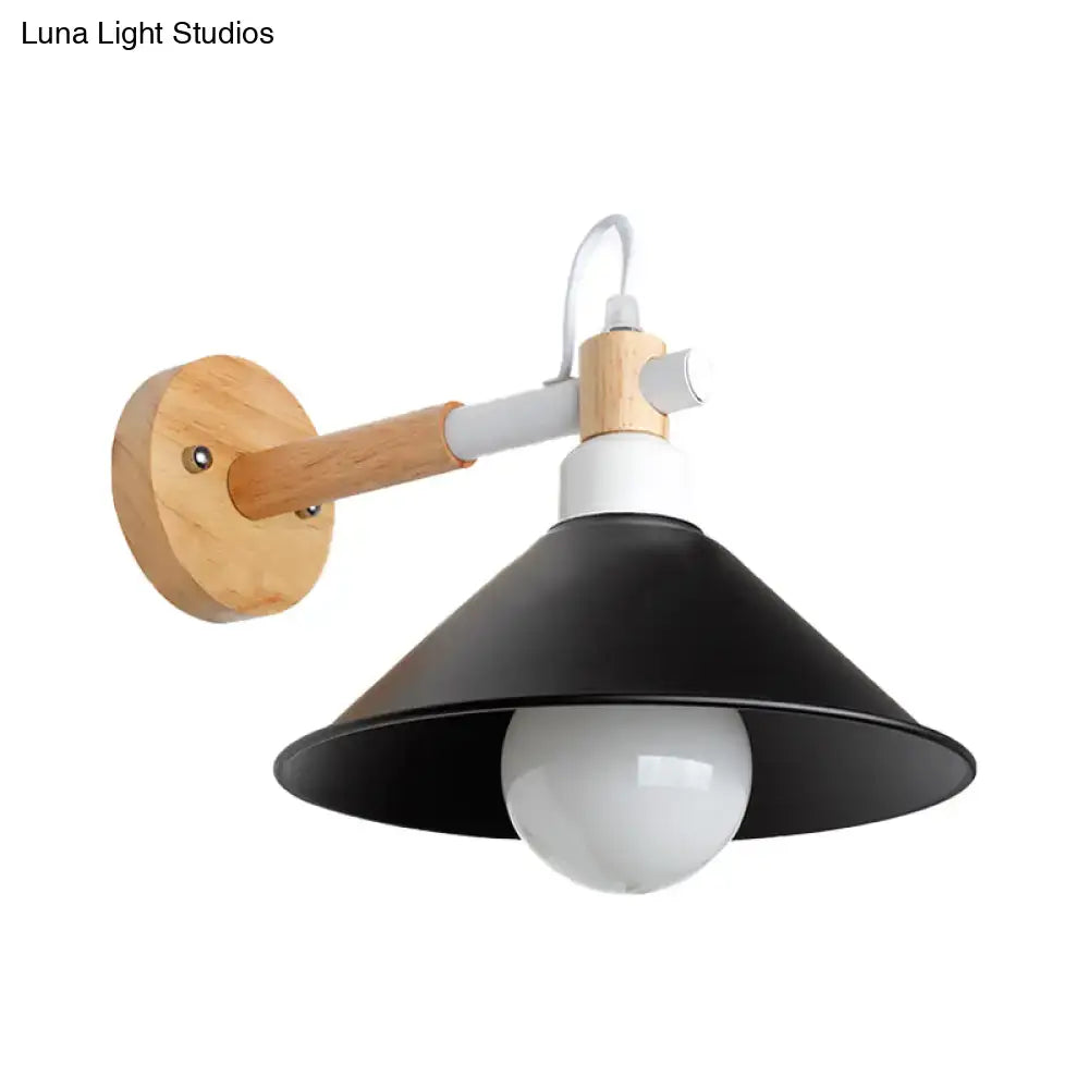 Black metal conic wall sconce with wooden arm and white mounting plate for nordic bedroom lighting