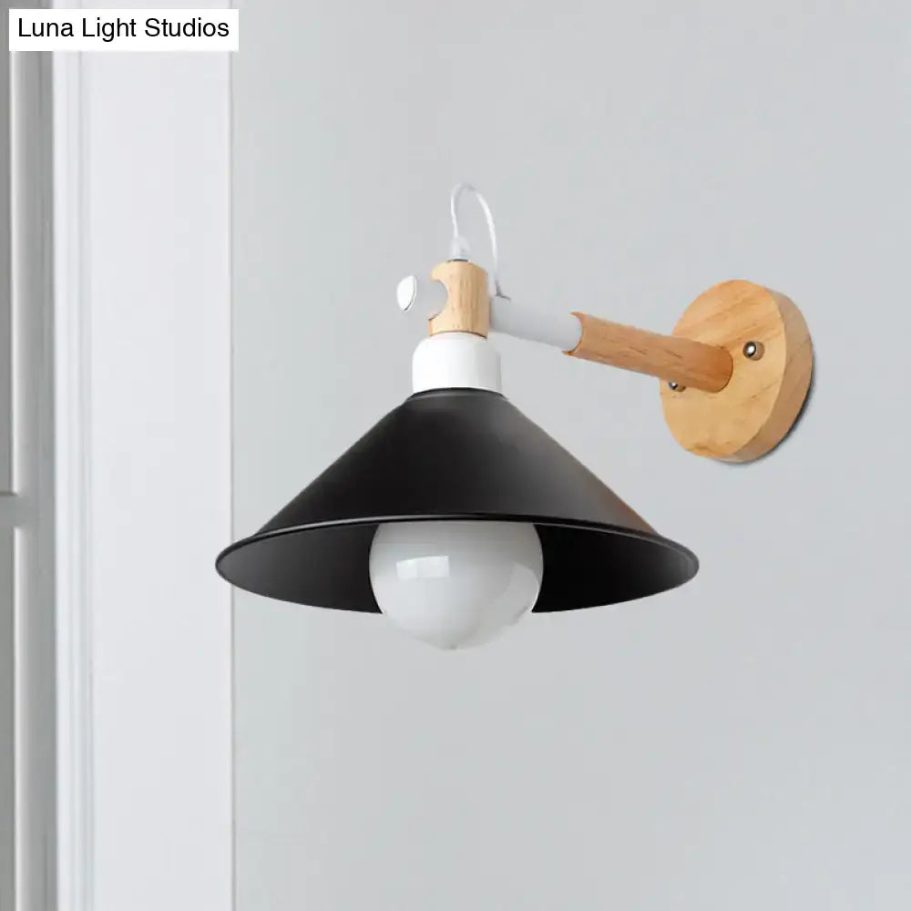 Black metal conic wall sconce with wooden arm and circular mounting plate for nordic bedroom lighting