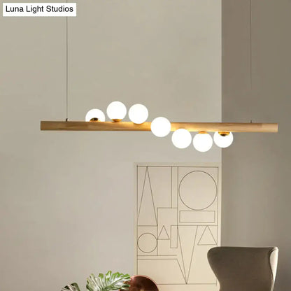 DecorBites™ nordic wood island pendant with beige wooden bar and globe glass bulbs for dining room chain cord length