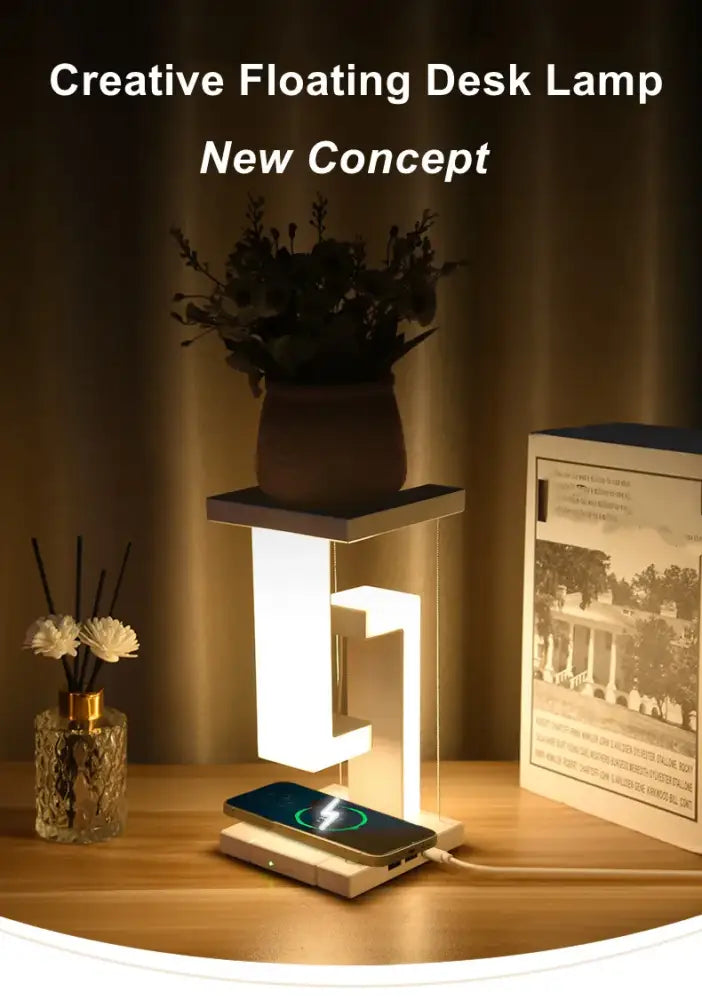 Modern white floating desk lamp with sleek geometric design and detachable wireless charger for bedroom or office decor