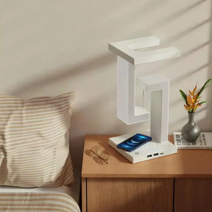 White geometric novel floating lamp with 10 w detachable wireless charger and integrated usb ports for bedroom use