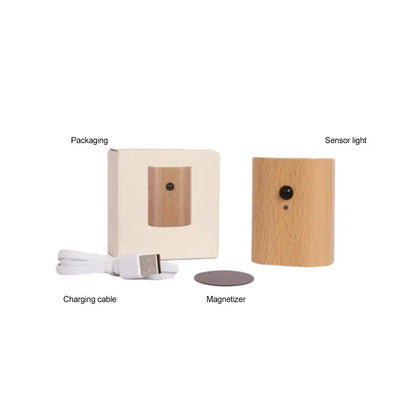 Lightweight wooden cylindrical decorbites odin battery operated wall sconce with black circular lens and small sensor dot