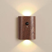 Decorbites odin warm-toned wooden battery operated wall sconce with sleek cylindrical design and motion sensor