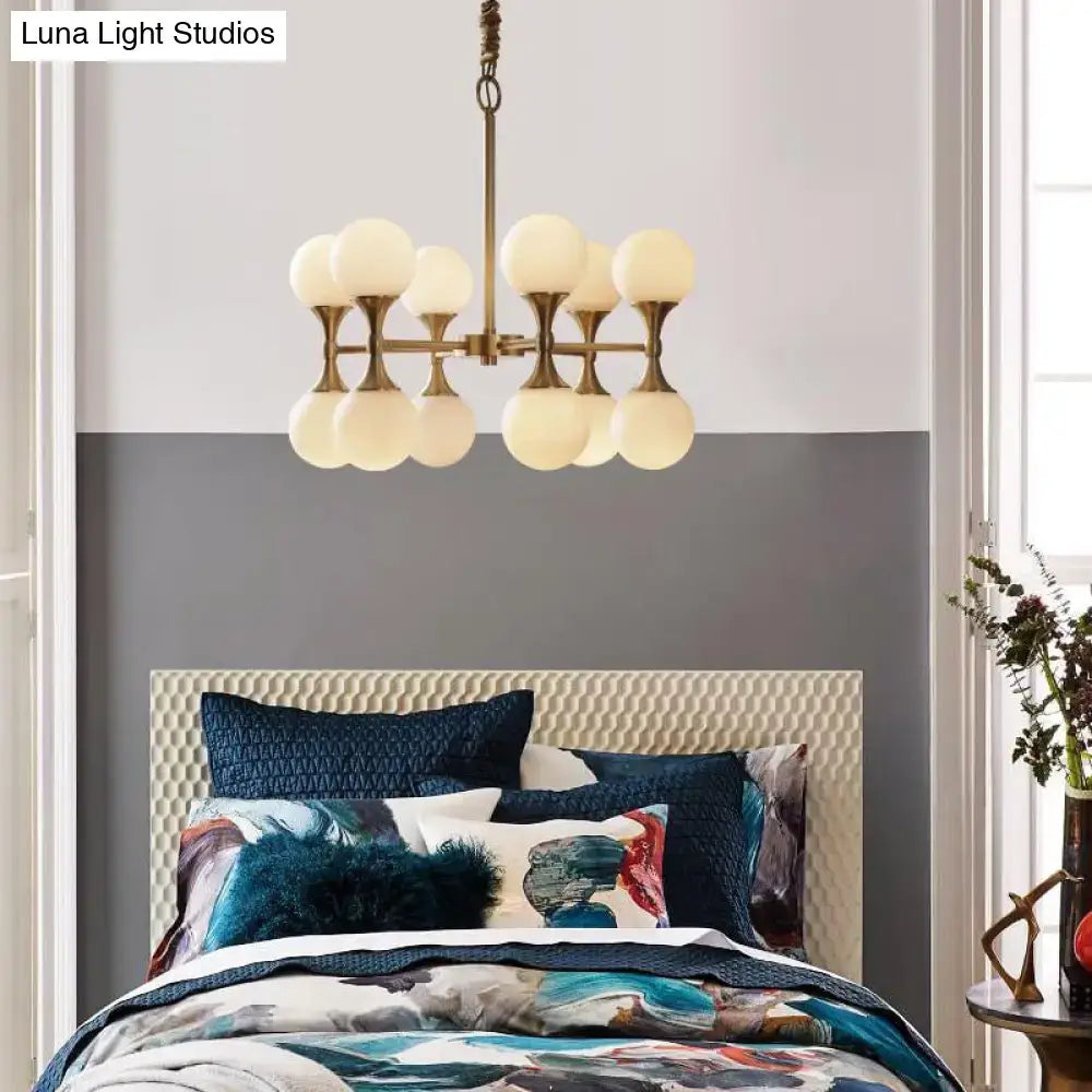 Brass-finished DecorBites opal glass chandelier light with 12 glass globe heads for postmodern ceiling hanging