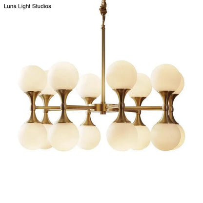 Decorbites™ opal glass chandelier light with 12 brass frosted glass globe heads in a postmodern ceiling design